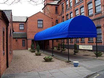 Walkway canopy leading to hotel doorway